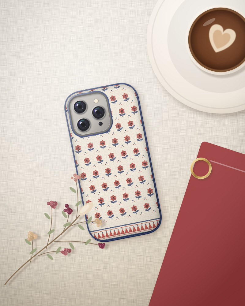 Jaipur Buta Case on iPhone 16 Pro, flat-lay