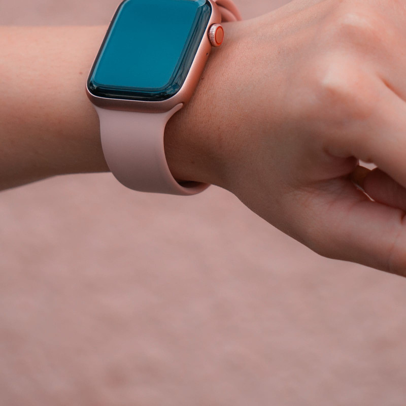 Pink sport strap on a wrist