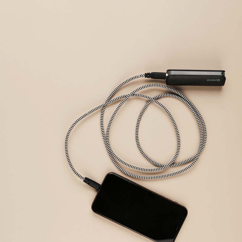 Braided USB-C cable charging a phone