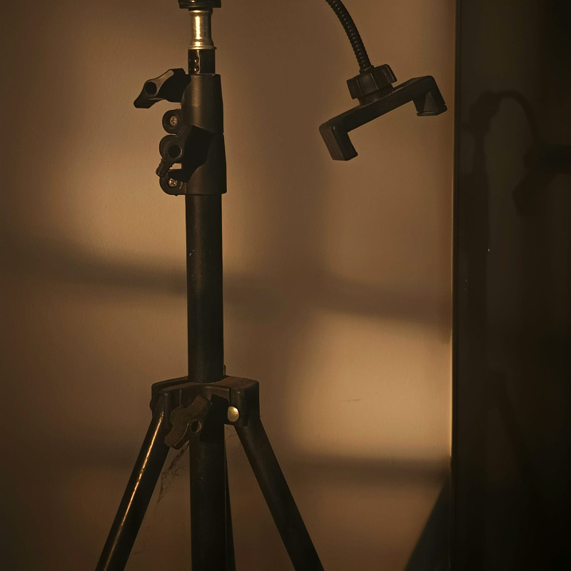 Tripod with a phone clamp
